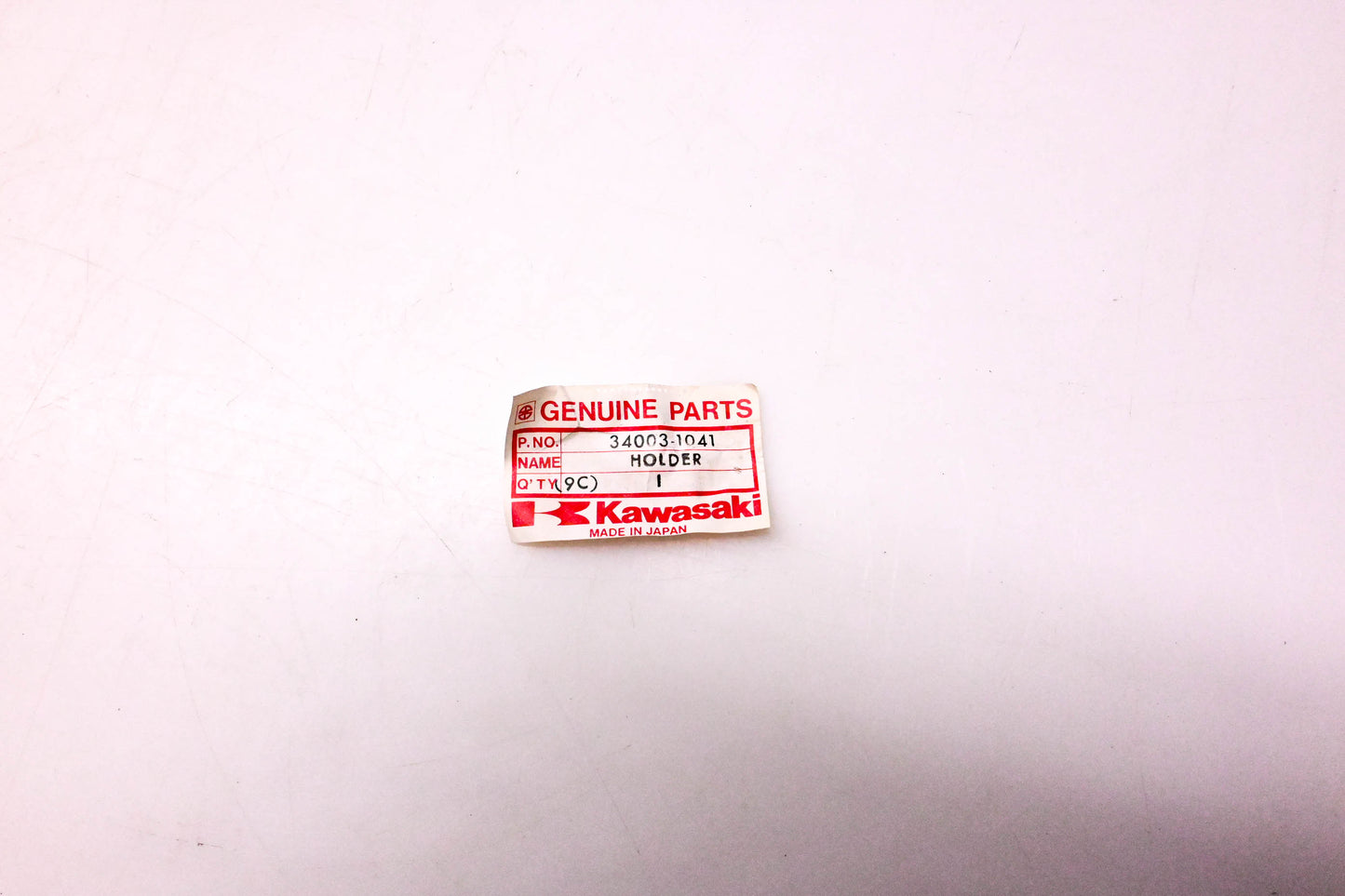 New OEM Kawasaki 34003-1041 Left Hand Foot Peg Bracket NOS