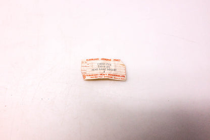 New OEM Kawasaki 23008-011 Head Lamp Socket NOS