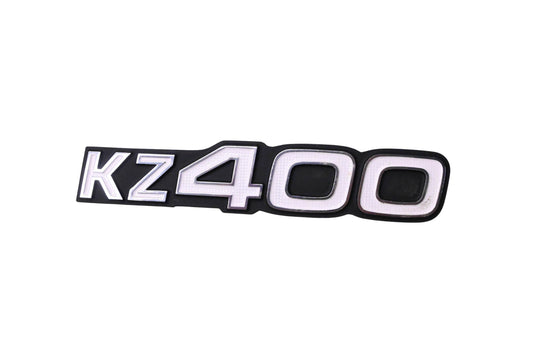 New OEM Kawasaki 56018-231 Side Emblem NOS