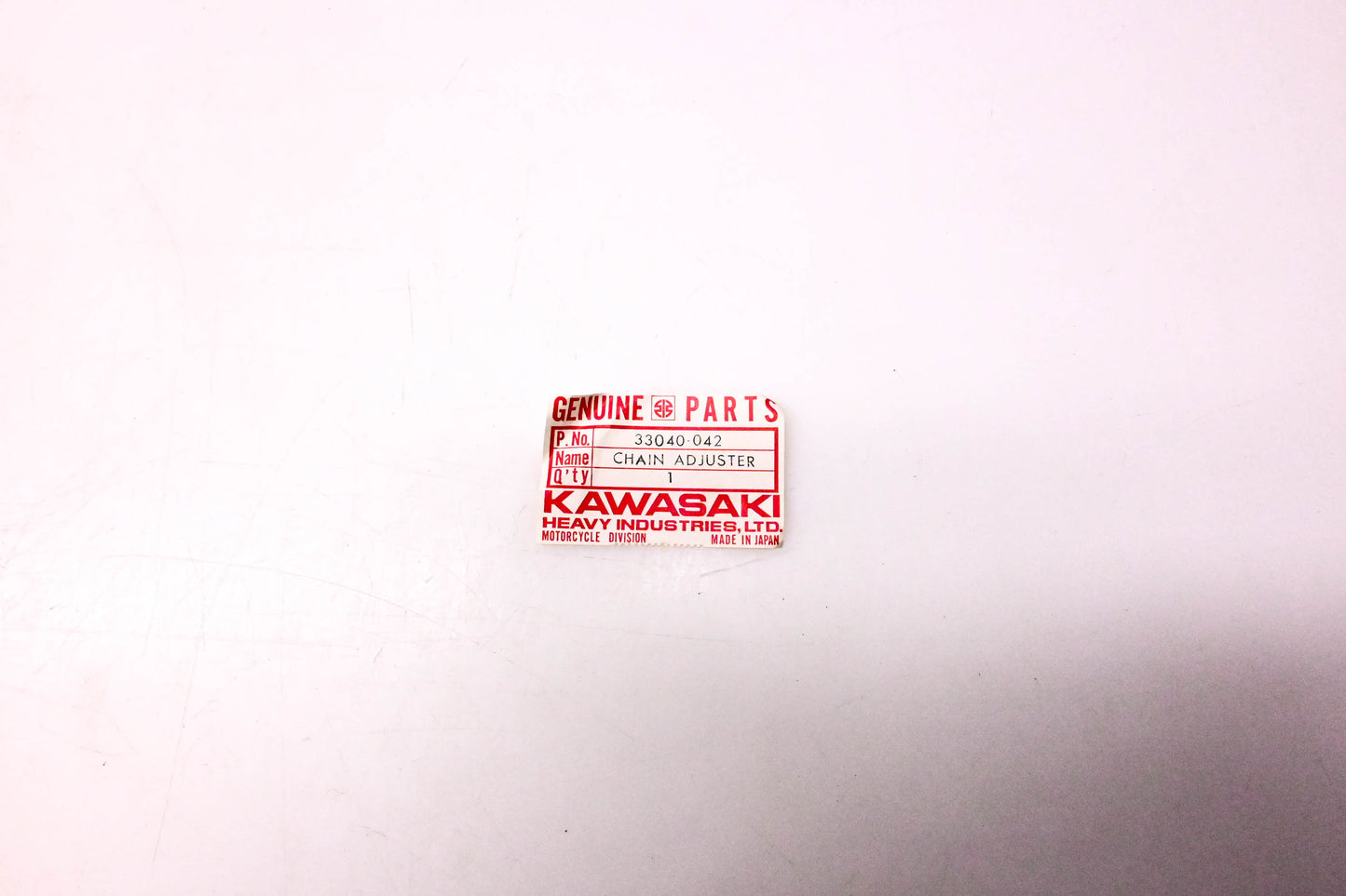 New OEM Kawasaki 33040-042 Chain Adjuster NOS