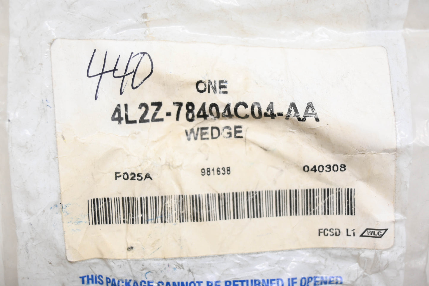New OEM Ford 4L2Z-78404C04-AA Wedge Stopper NOS