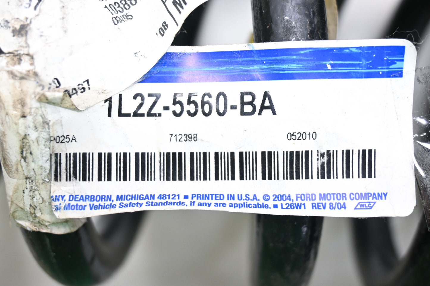 New OEM Ford 1L2Z-5560-BA, 1L24-5534-BD Coil Spring NOS