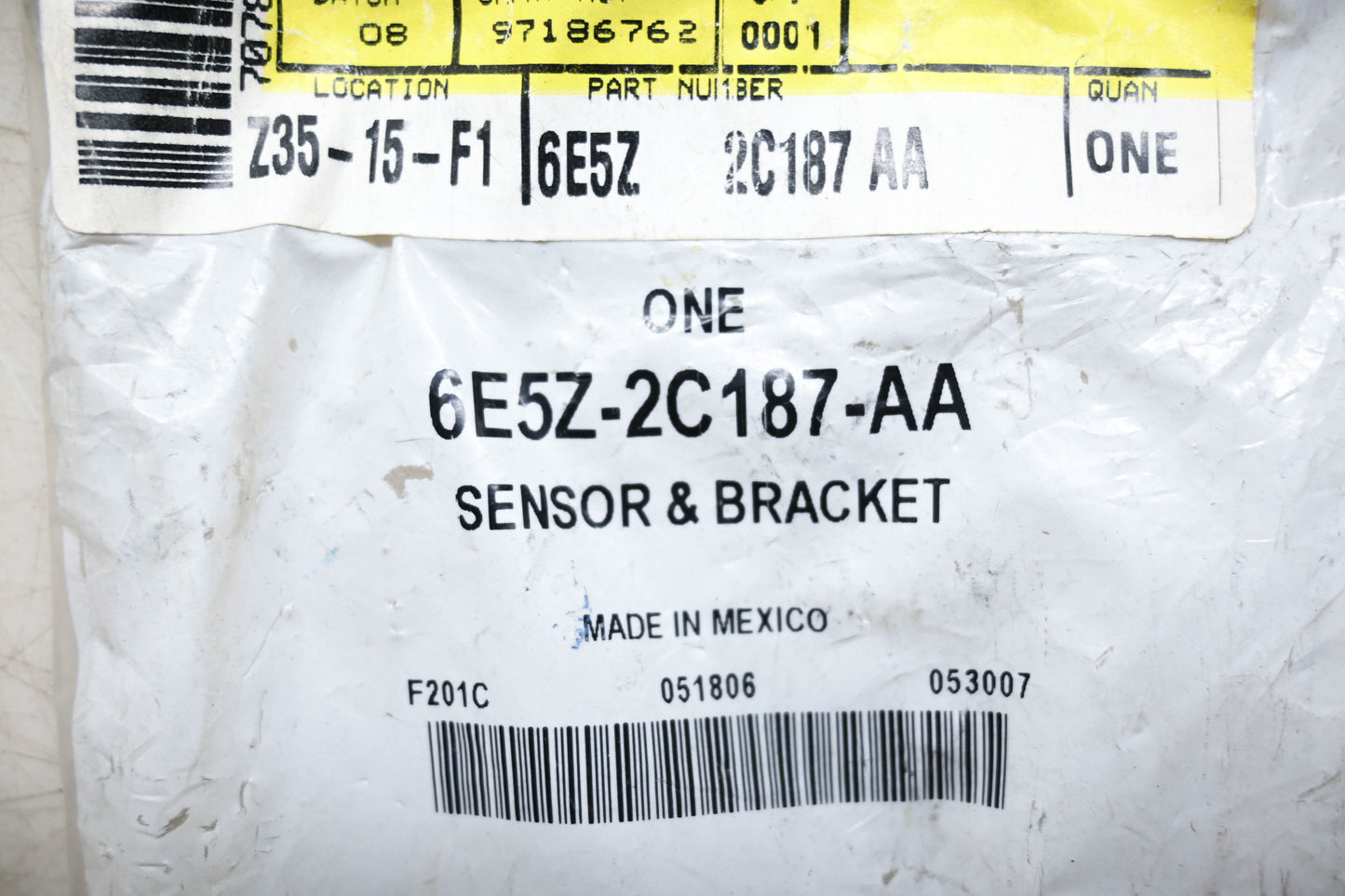 New OEM Ford 6E5Z-2C187-AA Wheel Speed Sensor and Bracket NOS