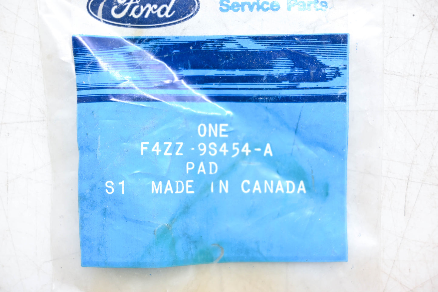 New OEM Ford F4ZZ-9S454-A Pad NOS