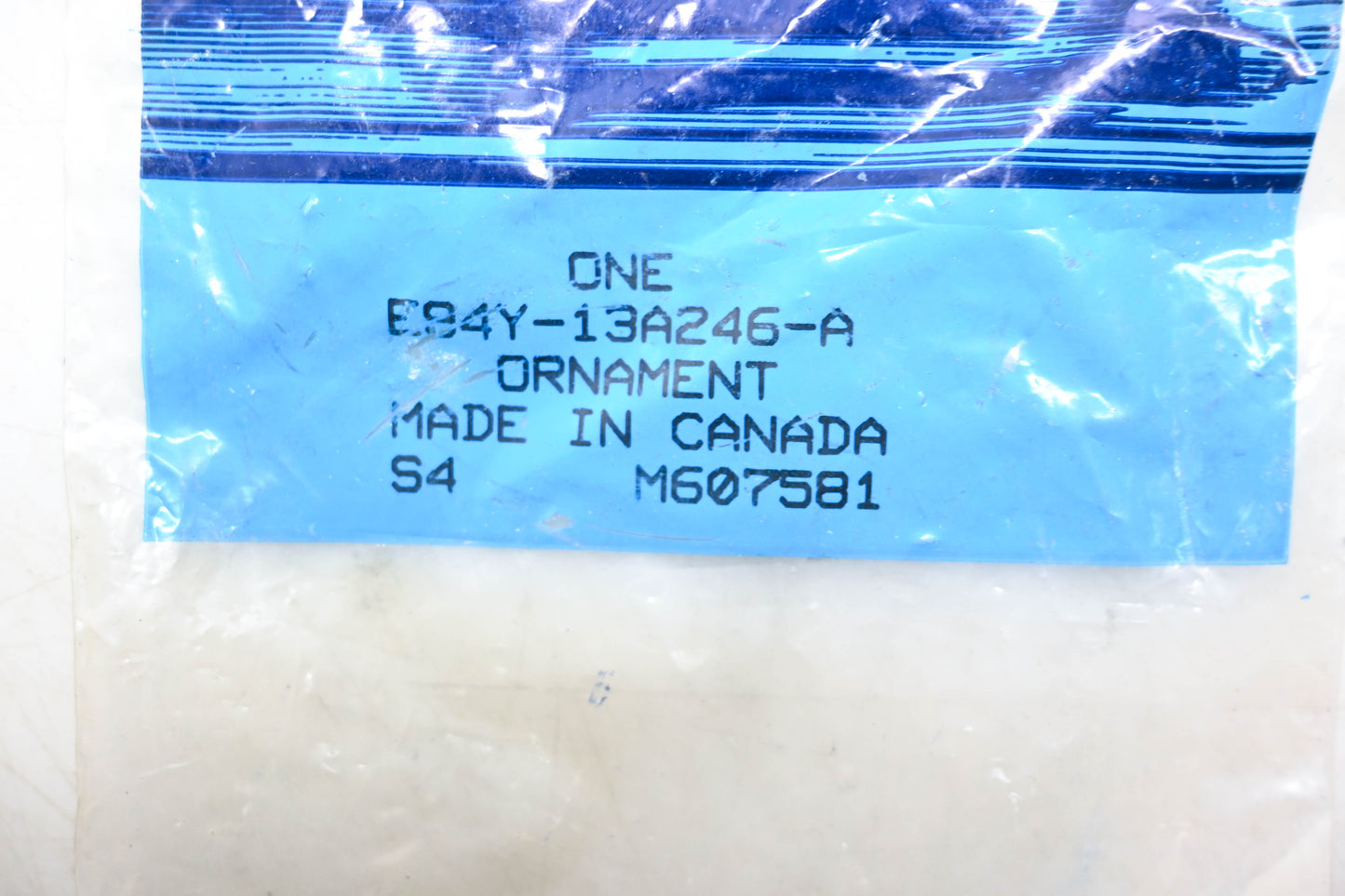 New OEM Ford E94Y-13A246-A Sable Front Grill Emblem NOS