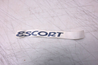 New OEM Ford F7CZ-5442528-CE Escort Nameplate NOS