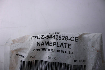 New OEM Ford F7CZ-5442528-CE Escort Nameplate NOS