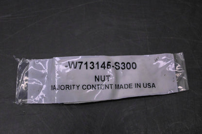 New OEM Ford W713145-S300 Applique Nut NOS