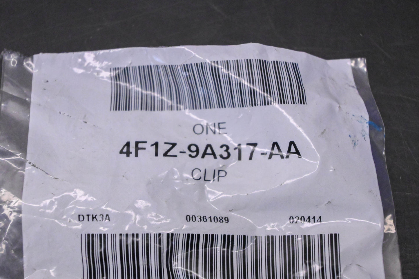 New OEM Ford 4F1Z-9A317-AA Clip NOS