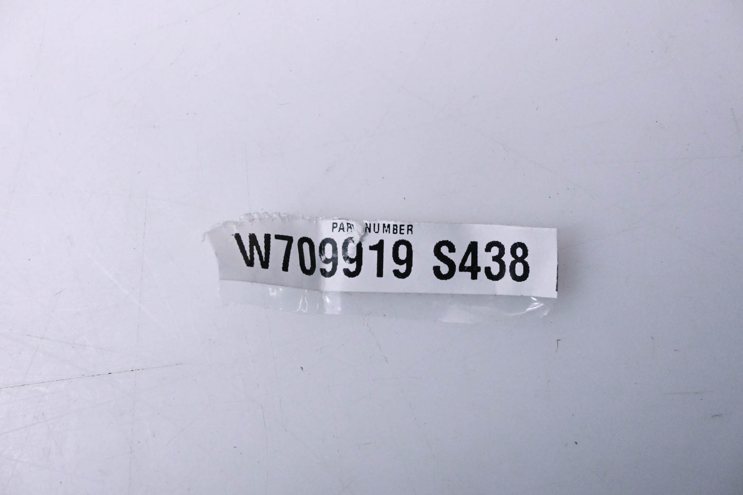 New OEM Ford W709919-S438 Cowl Grille Clip NOS