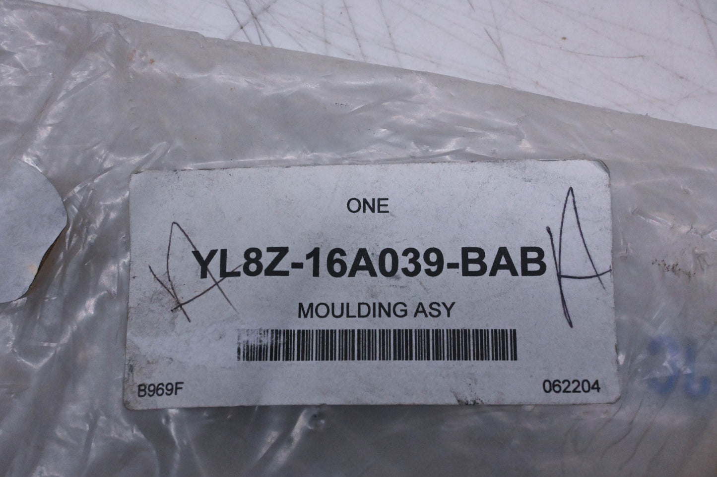 New OEM Ford YL8Z-16A039-BAB Front Wheel Arch Moulding NOS
