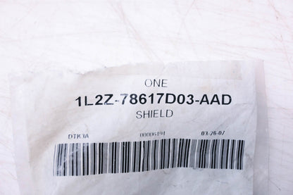 New OEM Ford 1L2Z-78617D03-AAD Shield NOS
