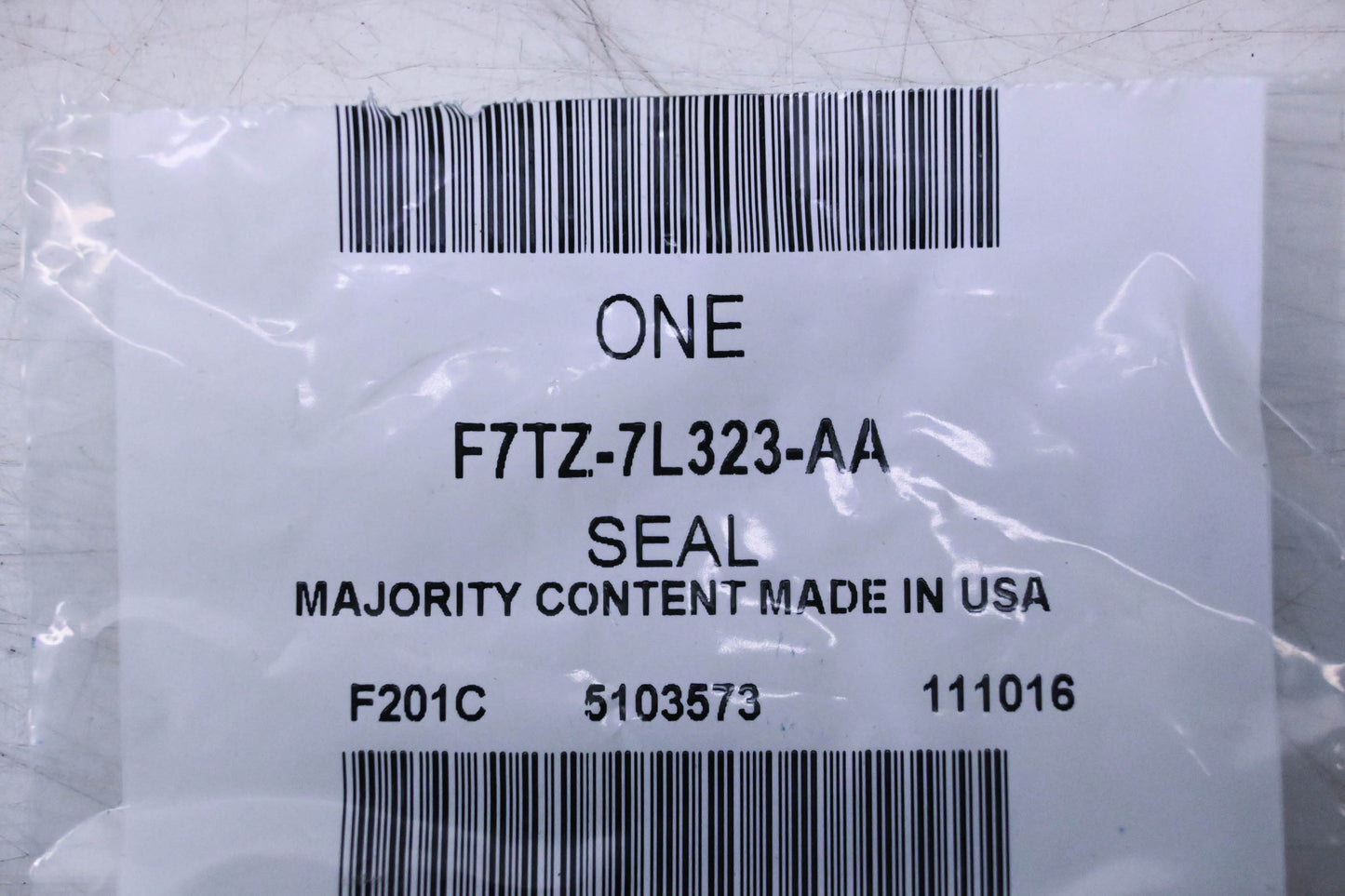 New OEM Ford F7TZ-7L323-AA Seal NOS