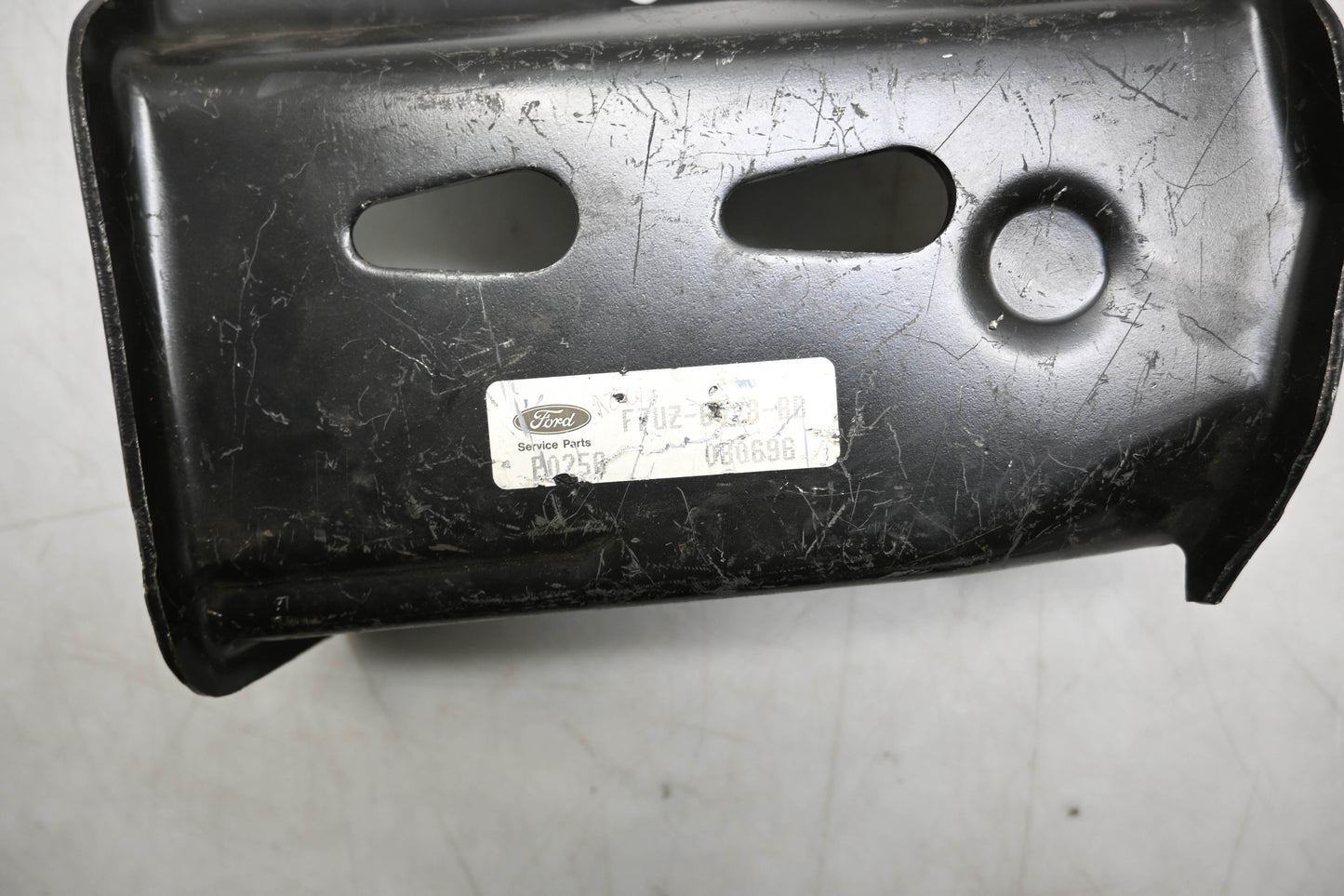 New OEM Ford F7UZ-6UZ8-BB, F7UZ-6028-BB Mounting Bracket NOS