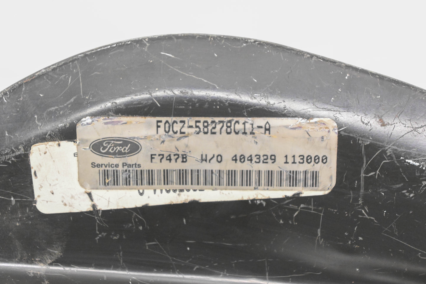 New OEM Ford FOCZ-58278C11-A Left Lamp Housing Bracket NOS