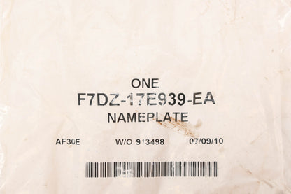 New OEM Ford F7DZ-17E939-EA Taurus Emblem Nameplate NOS