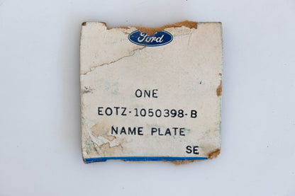 New OEM Ford E0TZ-1050398-B, E0TB-10280C82-A XLT Nameplate NOS