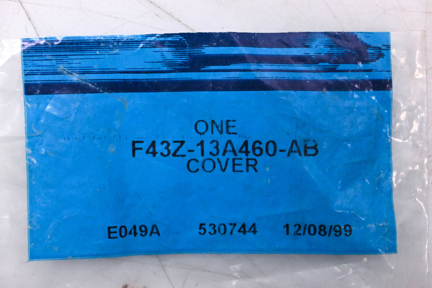New OEM Ford F43Z-13A460-AB Cover NOS