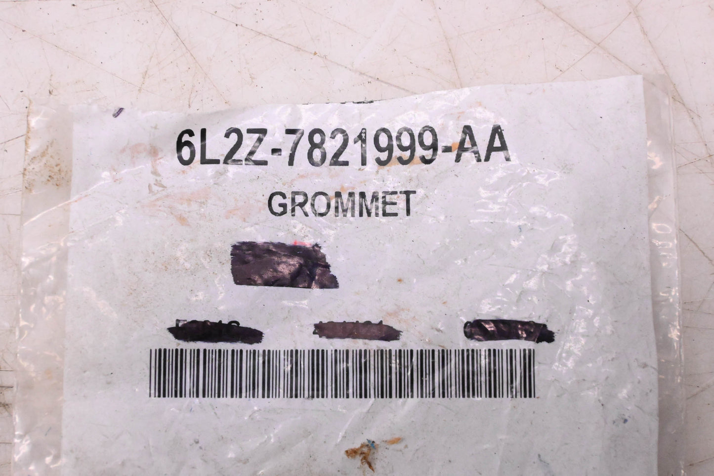 New OEM Ford 6L2Z-7821999-AA Grommet NOS