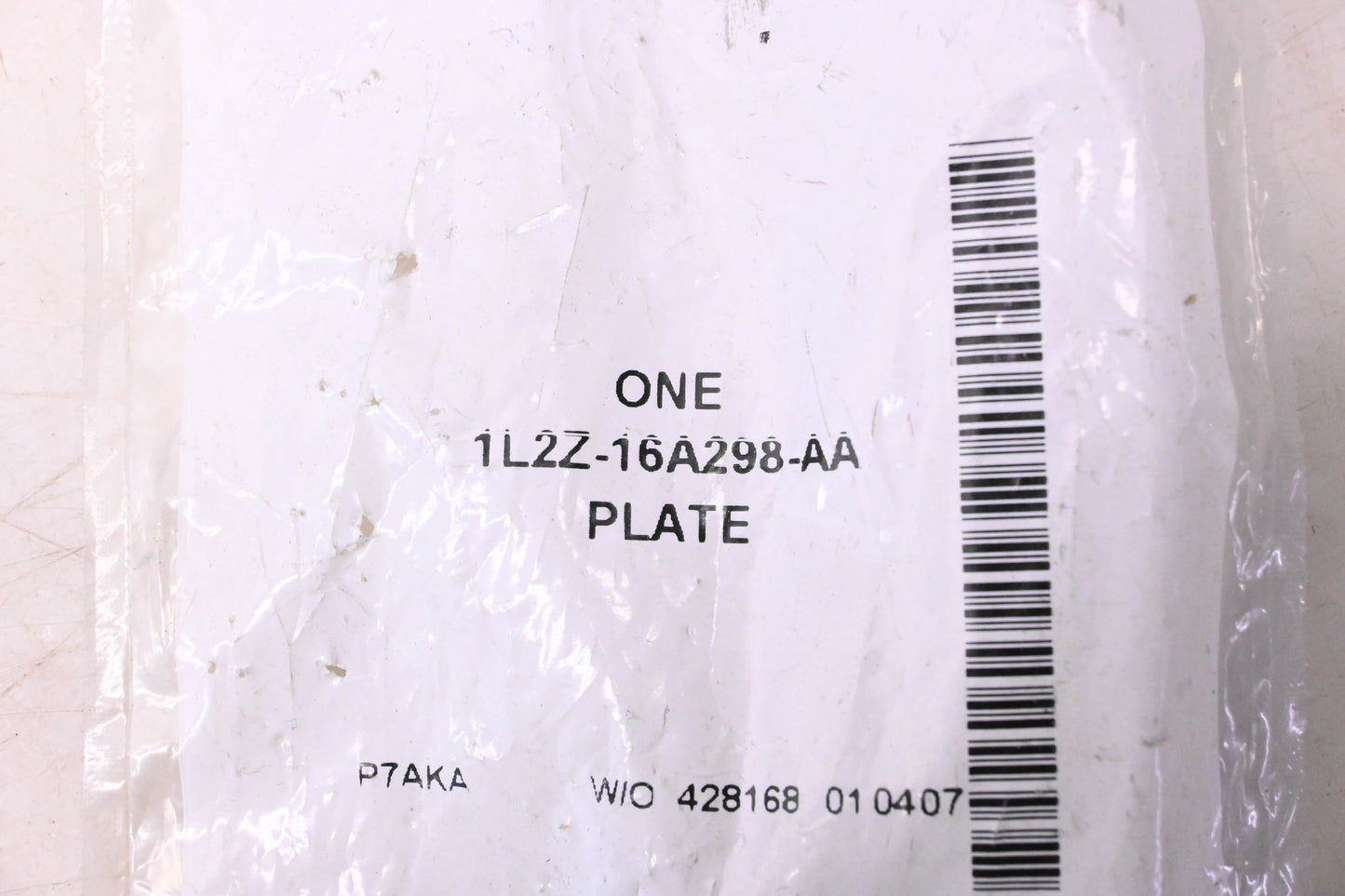 New OEM Ford 1L2Z-16A298-AA Front Fender Apron Plate NOS