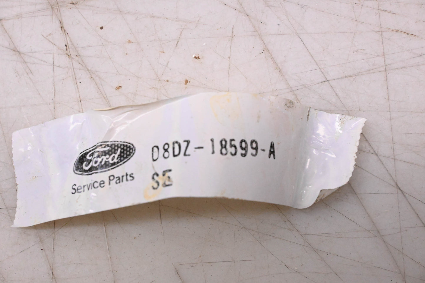 New OEM Ford D8DZ-18599-A Hose Elbow NOS