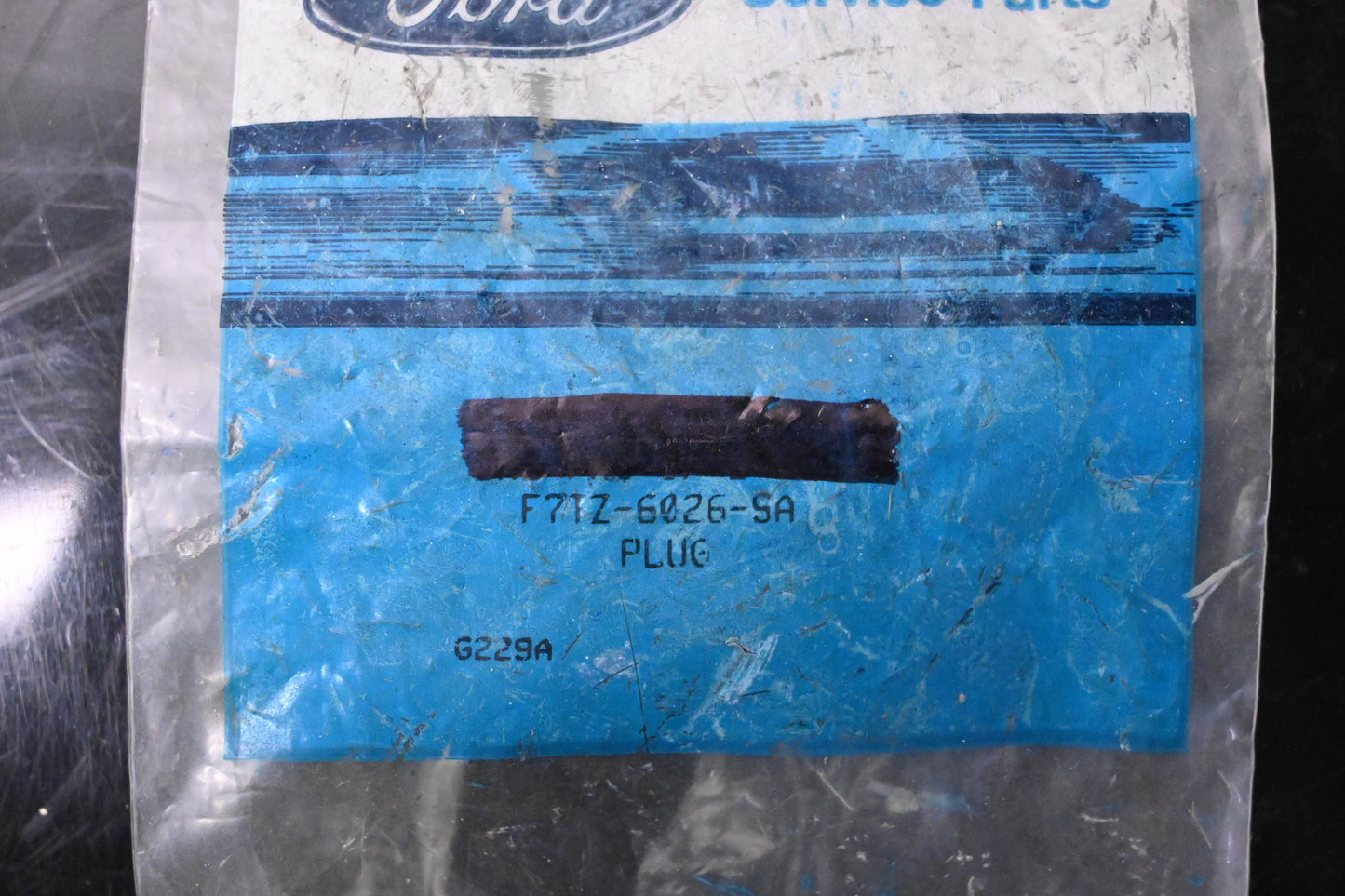 New OEM Ford F7TZ-6026-SA Engine Plug NOS