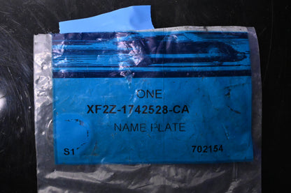 New OEM Ford XF2Z-174252-CA Emblem Nameplate NOS