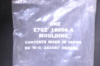 New OEM Ford E7GZ-16004-A Fender Moulding NOS