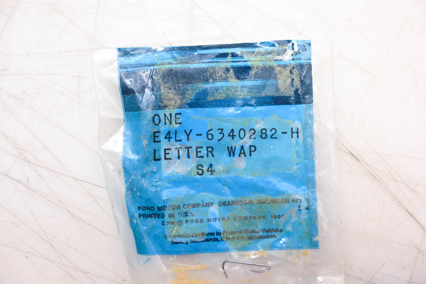 New OEM Ford E4LY-6340282-H Letter 'L' Emblem NOS