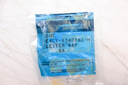 New OEM Ford E4LY-6340282-H Letter 'L' Emblem NOS