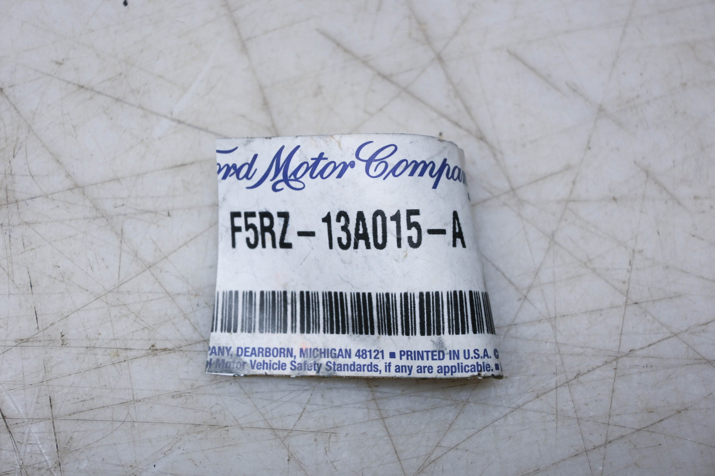 New OEM Ford F5RZ-13A015-A Lower Headlamp Mounting Bracket NOS