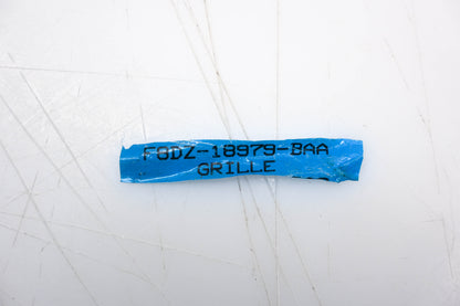 New OEM Ford F8DZ-18979-BAA Speaker Grille Nameplate Cover NOS