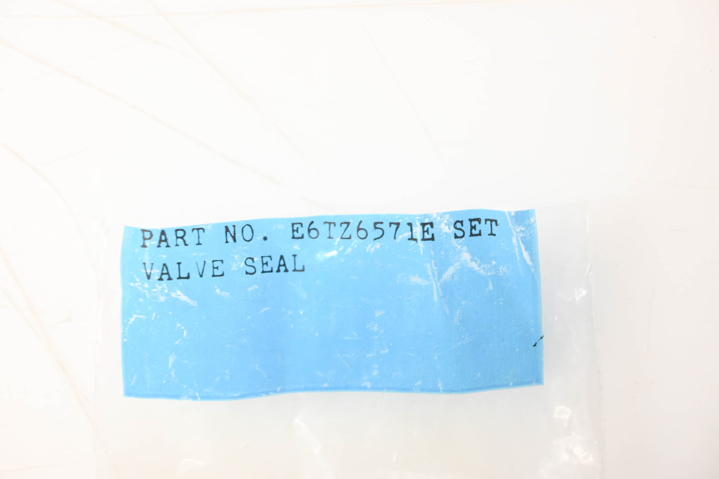 New OEM Ford E6TZ-6571-E Valve Stem Seals Qty 4 NOS