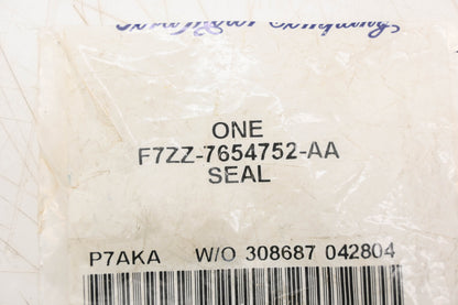 New OEM Ford F7ZZ-7654752-AA Seal NOS