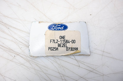 New OEM Ford F7LZ-11584-DD Bezel NOS
