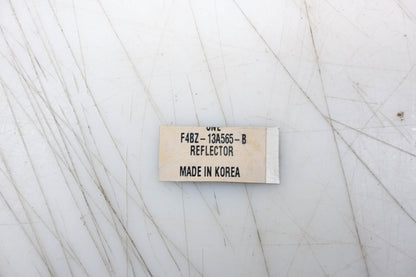 New OEM Ford F4BZ-13A565-B Reflector Assembly NOS