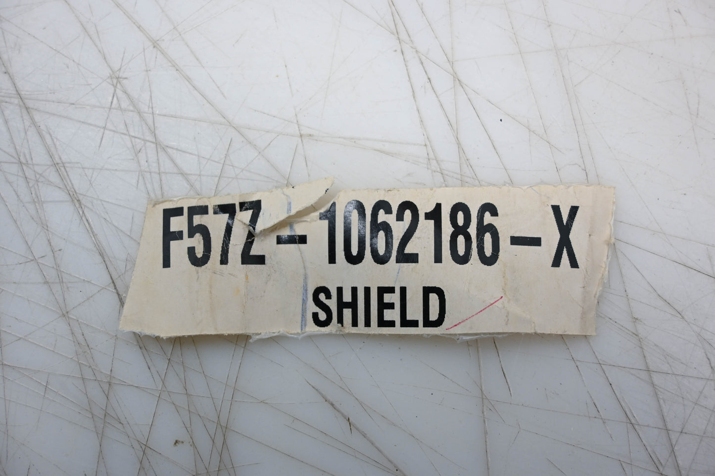 New OEM Ford F57Z-1062186-X Shield NOS