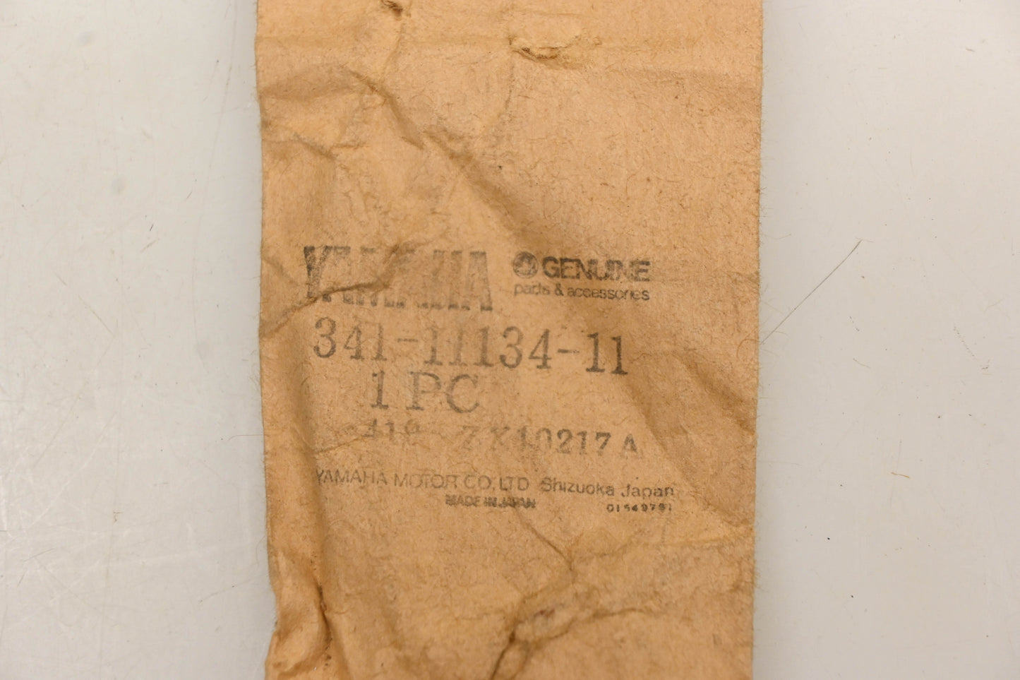 New OEM Yamaha 341-11134-11-00 Exhaust Valve Guide NOS