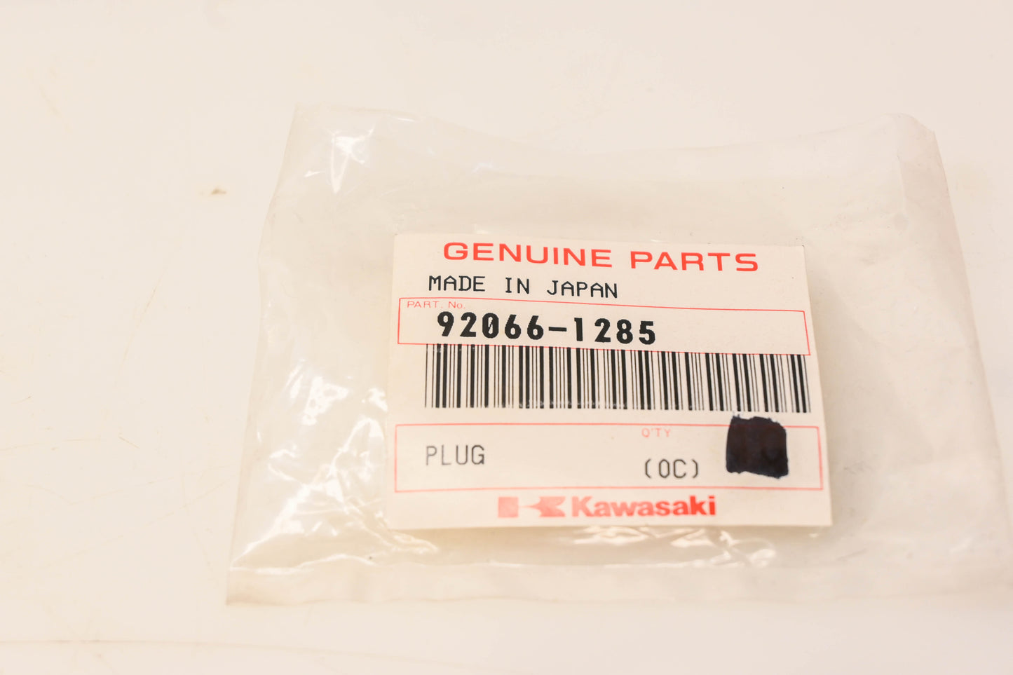New OEM Kawasaki 92066-1285 Plug NOS