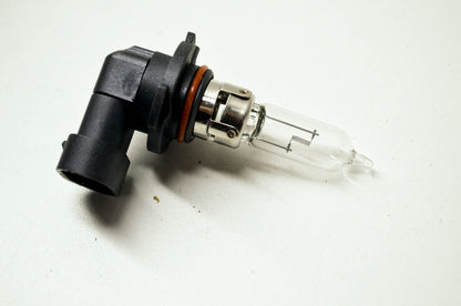 New Mighty HB3 9005 12v 65w Light Bulb NOS
