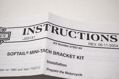 Softail Mini Tach Mounting Bracket NOS
