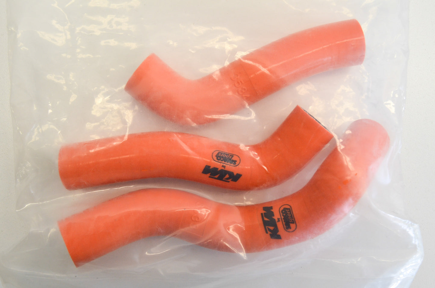 OEM KTM 77135924044 Orange Radiator Hose Kit NOS