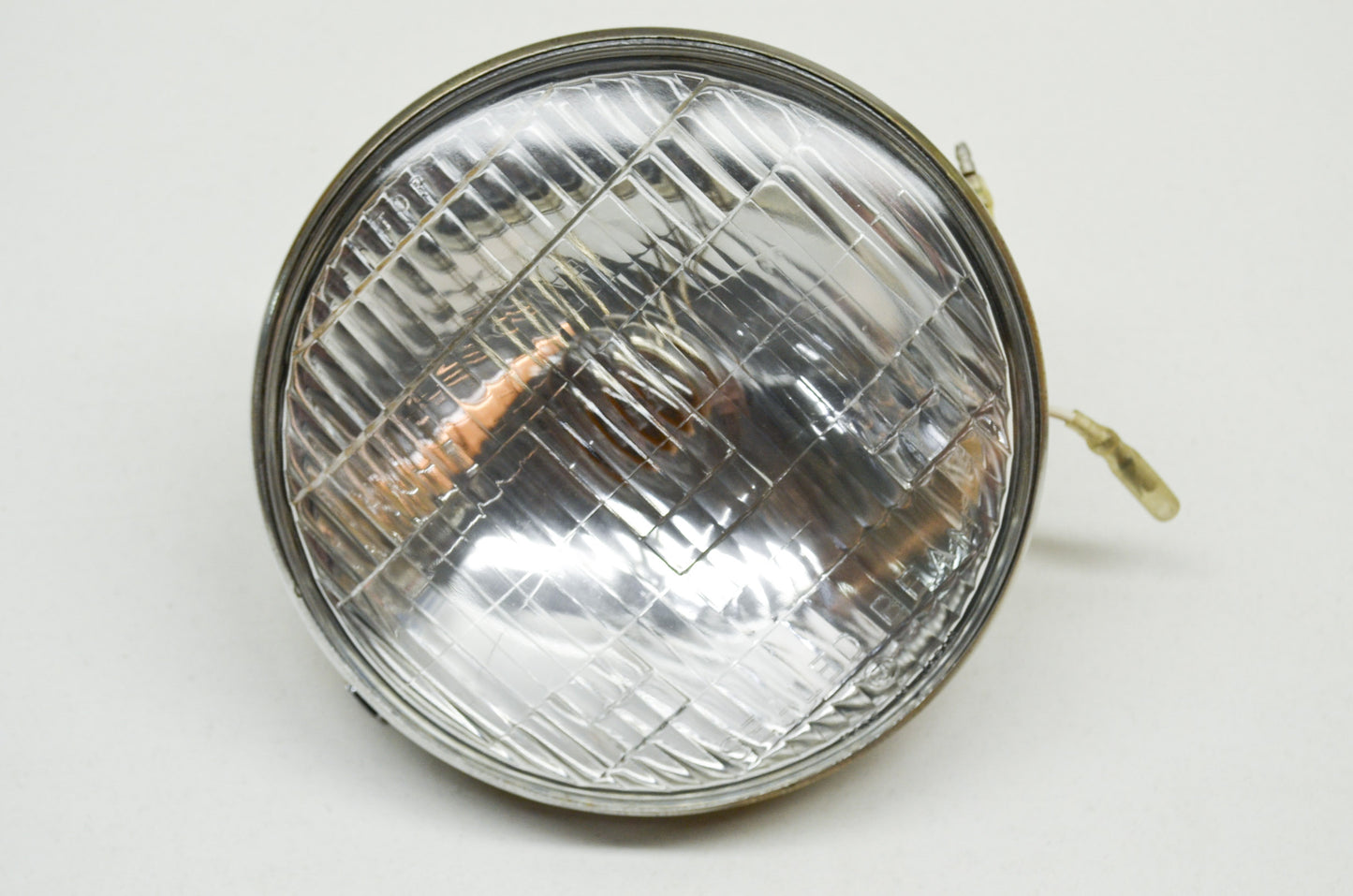 New Tonan Headlight 12v35/25w NOS
