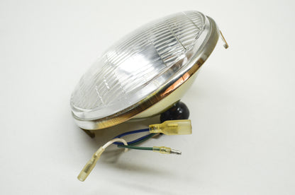 New Tonan Headlight 12v35/25w NOS