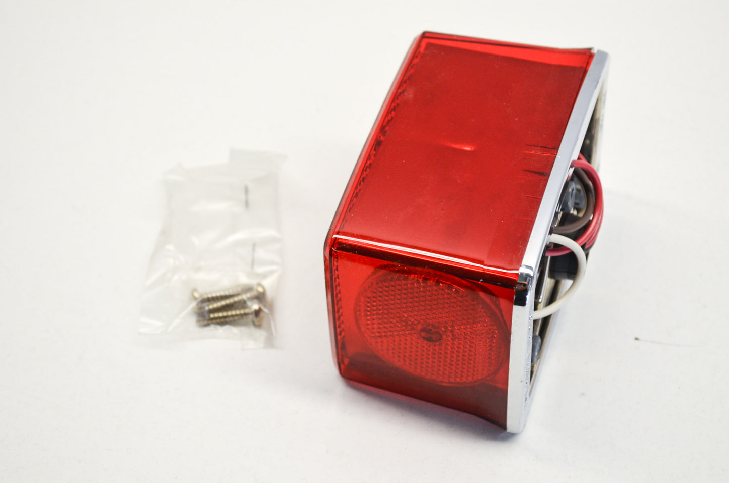 Peterson manufacturing Stop & Tail Light Chrome Trim NOS
