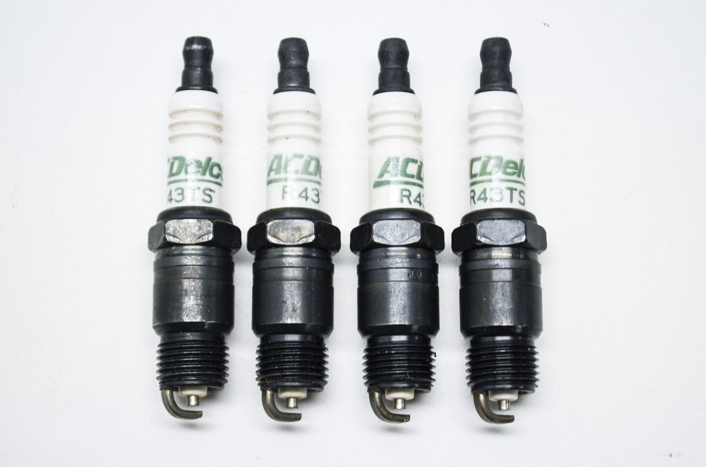 New AC Delco Spark Plugs Qty 4 NOS