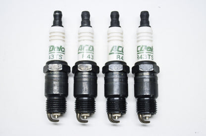 New AC Delco Spark Plugs Qty 4 NOS