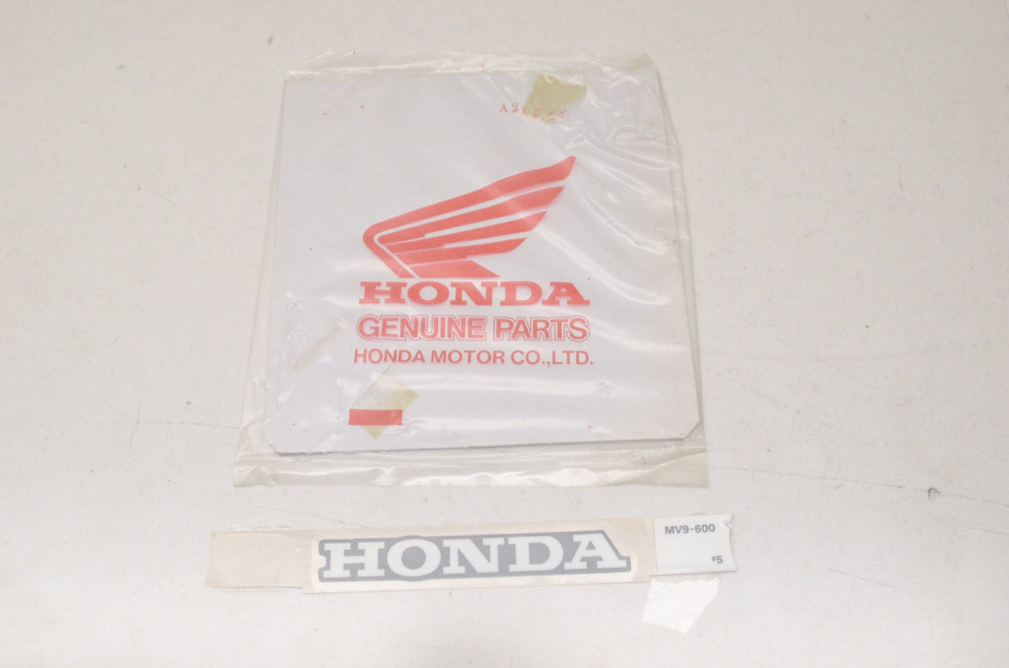New OEM Honda Seat Cowl Mark NOS