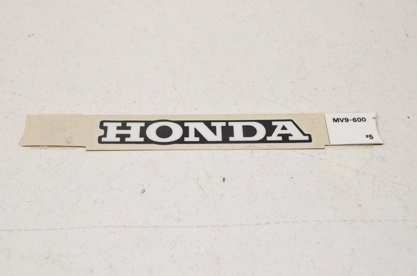 New OEM Honda Seat Cowl Mark NOS