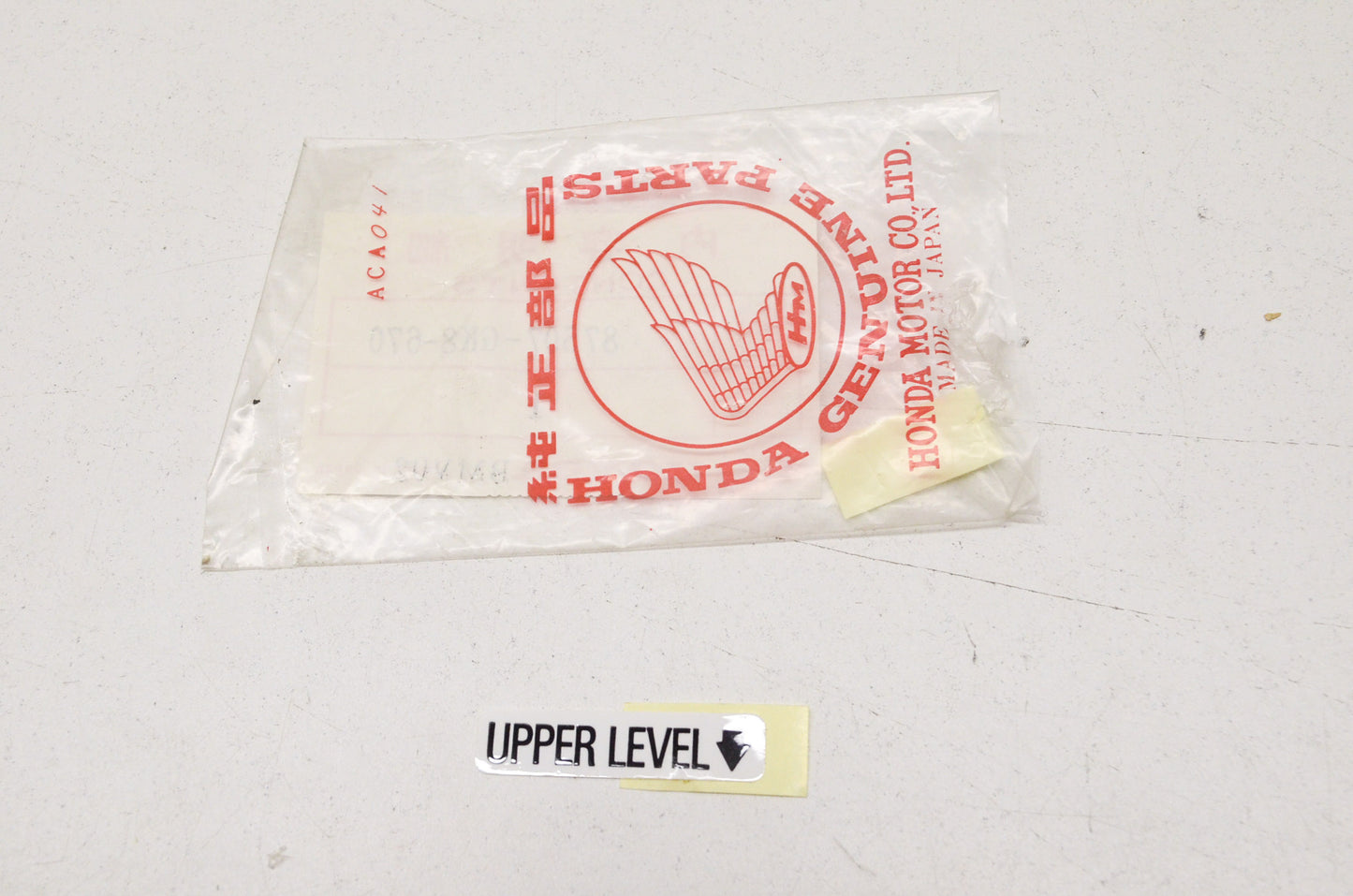 OEM Honda 87507-GK8-670 Upper Level Label NOS